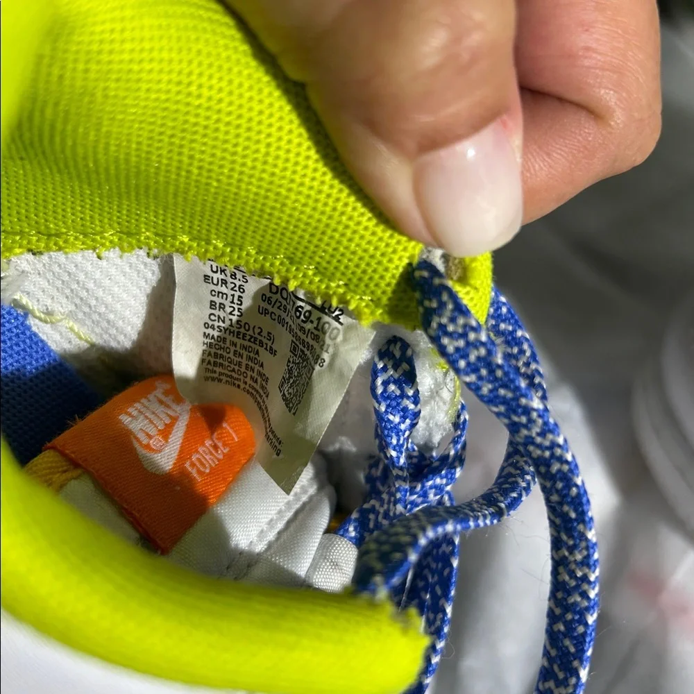Nike White Sneakers with Blue and Yellow Highlights